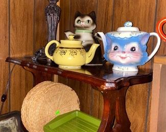 Trays, tea pots. Cat, miss priss 