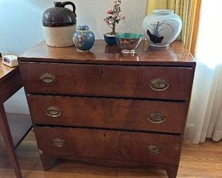 Antique flame mahogany dresser