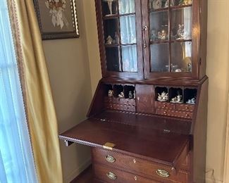 Gorgeous mahogany secretary display. Matches sideboard and two drop leaf side tables. 