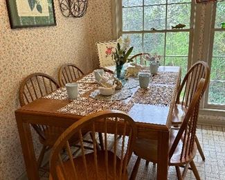 Solid oak dining table and 6 chairs