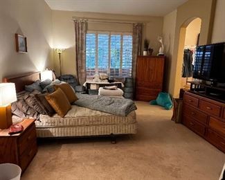 Master bedroom with furniture & lots of misc