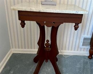 Victorian Eastlake marble-top side table.