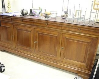 "Grange" sideboard with protective mats on top