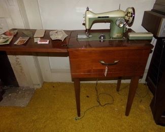 New Home cabinet sewing machine