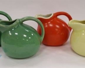 FOUR BALL CREAM PITCHERS