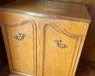 Part of the original set, was repurposed by Mr. Randall to store household items, originally a T.V. cabinet.