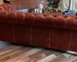 $2,200 - Red leather Chesterfield sofa 89x38x33 Very good condition