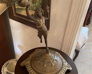 $100 Faux Horn on brass figure stand 26x21