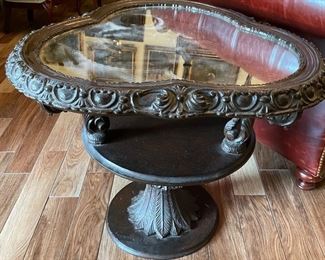 $200 Tri shaped round carved wood and mirror table 24x28x28