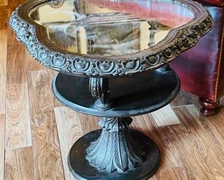 $200 Tri shaped round carved wood and mirror table 24x28x28