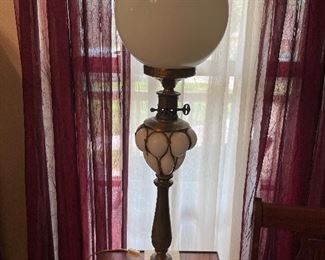 $90 White glass globe lamp and marble base and metal with egg shaped center 