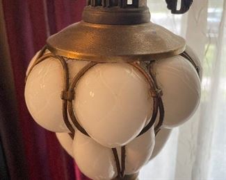 $90 White glass globe lamp and marble base and metal with egg shaped center 