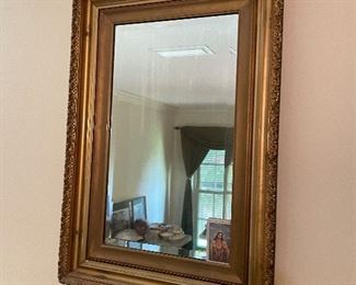 $60 Gilded platser mirror above tall chest 