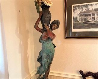 $275 - Sculpture Lady holding an urn .