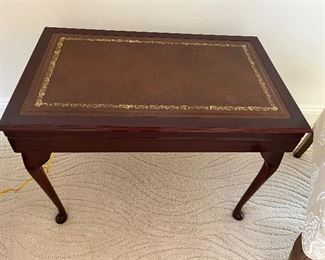 21 - $595 	Sheffield England dinnerware silver plated in table 22x30x19		
