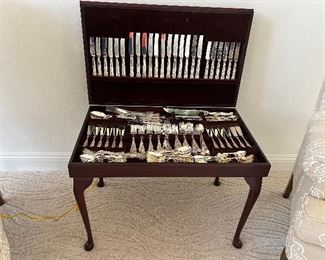 21 - $595 	Sheffield England dinnerware silver plated in table 22x30x19	