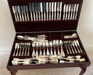 21 - $595 	Sheffield England dinnerware silver plated in table 22x30x19	