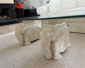 32 - $295 	Glass bevel top Elephant cream table 17Tx5'Wx30W