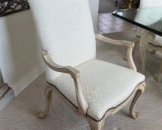 39 - $1,095 	Glass bevel (1/2") dining top 29Hx86Lx46W with 2 cream armchairs 42Tx25W & 4 chairs SOLD as a set 		
