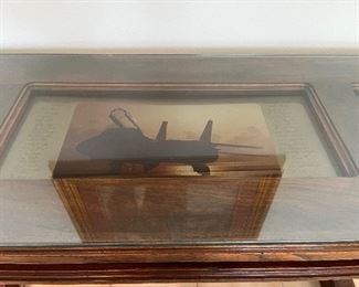 51 - $250 Hall wood table 31x49x16 Tom Cat plane memorabilia (crack glass corner)