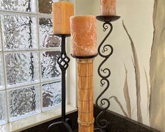 63 - $70 	Set of 3 iron candle holders 37"Tallest one 		
