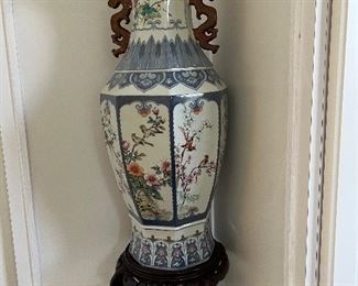 67 - $90 	Oriental vase on stand 27x12		
