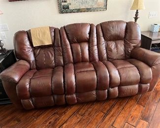 77 - $175 	Double recliner vegan leather 33"Hx 88Lx 39"W - As is 		