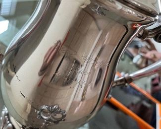 97 - $245 	Silver plated tea service with tray Poole pattern Bristol 8 pieces mono the Witchita Wives 		
