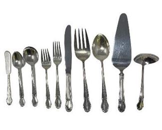 "Wedding Bell" Sterling Silver Flatware Set by Rogers. Six-piece service for 12 and four serving pieces.