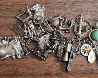Heavy vintage sterling silver charm bracelet