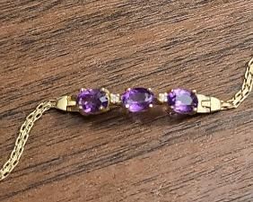 14k yellow gold bracelet with tiny Diamonds and 3 Amethyst gemstones