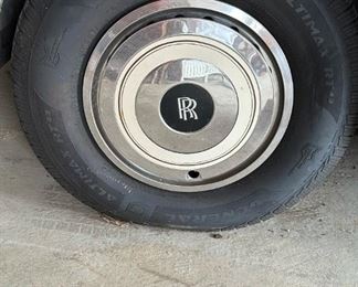 Update: Buy out-right price: $19,500. 

On offer is this beautiful 1988 Silver Spur Rolls Royce.  
Upholstery: Tan hide/piped magnolia hide. Paint color is magnolia and tan everflex
Mileage: 101,135
To place a bid: Text “Rolls Royce” to  615-854-8535 to get bid-site link. 
Bids will be accepted through 3:00P CST Sunday 3/26.