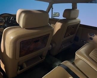 Update: Buy out-right price: $19,500. 

On offer is this beautiful 1988 Silver Spur Rolls Royce.  
Upholstery: Tan hide/piped magnolia hide. Paint color is magnolia and tan everflex
Mileage: 101,135
To place a bid: Text “Rolls Royce” to  615-854-8535 to get bid-site link. 
Bids will be accepted through 3:00P CST Sunday 3/26.