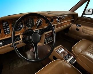 Update: Buy out-right price: $19,500. 

On offer is this beautiful 1988 Silver Spur Rolls Royce.  
Upholstery: Tan hide/piped magnolia hide. Paint color is magnolia and tan everflex
Mileage: 101,135
To place a bid: Text “Rolls Royce” to  615-854-8535 to get bid-site link. 
Bids will be accepted through 3:00P CST Sunday 3/26.