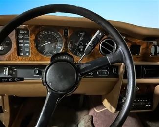 Update: Buy out-right price: $19,500. 

On offer is this beautiful 1988 Silver Spur Rolls Royce.  
Upholstery: Tan hide/piped magnolia hide. Paint color is magnolia and tan everflex
Mileage: 101,135
To place a bid: Text “Rolls Royce” to  615-854-8535 to get bid-site link. 
Bids will be accepted through 3:00P CST Sunday 3/26.