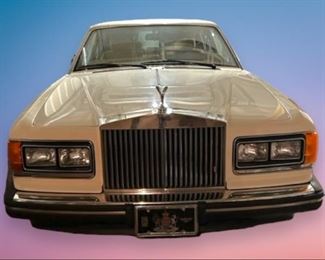 Update: Buy out-right price: $19,500. 

On offer is this beautiful 1988 Silver Spur Rolls Royce.  
Upholstery: Tan hide/piped magnolia hide. Paint color is magnolia and tan everflex
Mileage: 101,135
To place a bid: Text “Rolls Royce” to  615-854-8535 to get bid-site link. 
Bids will be accepted through 3:00P CST Sunday 3/26.