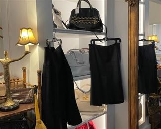 Chanel skirts, designer bags