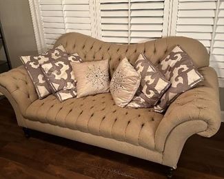 A pair of elegant sofas purchased from Restoration Hardware. 