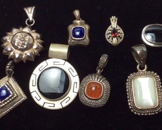 8 STERLING SILVER PENDANTS