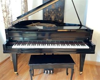 Straube Chicago Baby Grand Piano. Ebony Finish. Measures 57" D x 56.5" W. Photo 1 of 2.