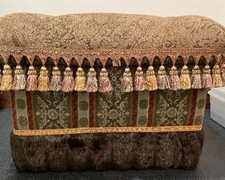 Upholstered Bench with Faux Fur & Tassel Trim. Measures 22" W x 16". Photo 1 of 2.