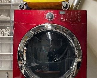 Wetfloor Commercial Mop and Bucket System. Shown With Front Load Washer & Dryer.