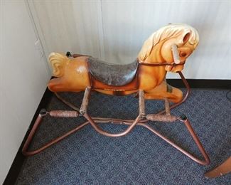 Plastic jumpy spring horse toy