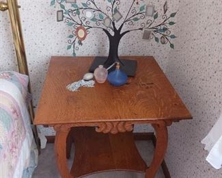 Antique oak side table and table perfume bottles
