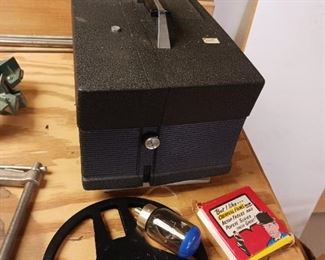 8 mm projector with Laurel and Hardy film included