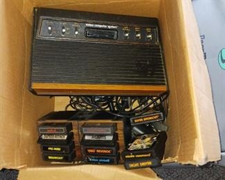 Atari 2600 gaming console with games
