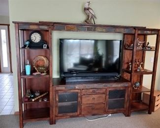 Wood entertainment center in flat screen television