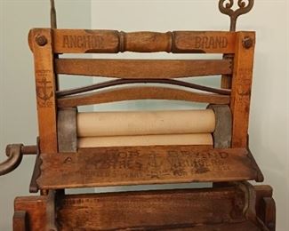 Antique Anchor brand clothes ringer washer