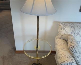 Floor lamp Brass and Glass.                                                                     16" Diameter, 53" T                                                                                           $50.00