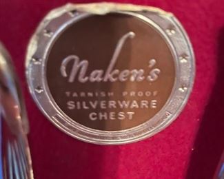 Naken's tarnish proof Silverware chest and 12 place setting.                                                                                                                      $75.00 Silverware and chest